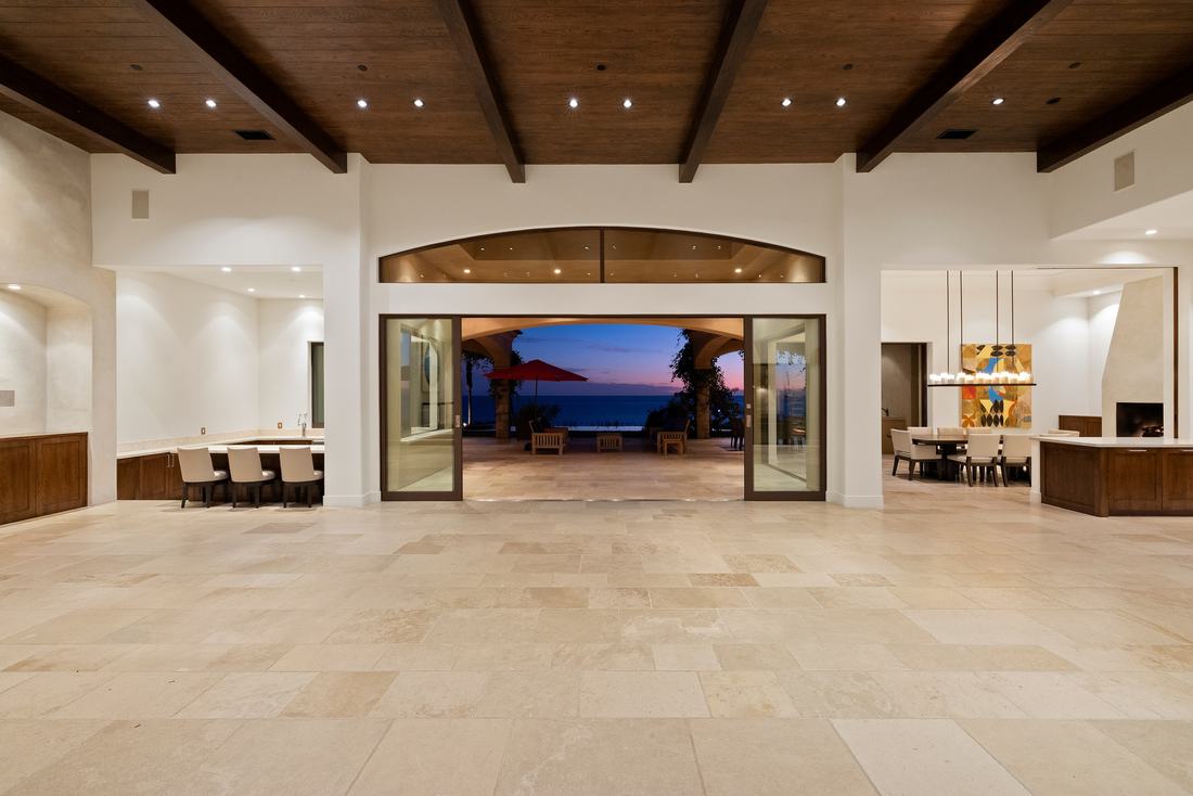 The great room: sixty feet under a sixteen-foot beamed ceiling