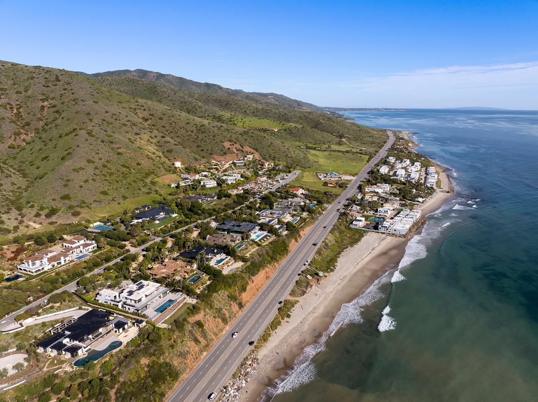 Aerial view along Pacific Coast Highway with the MariSol bluff, the beach and the Santa Monica Mountains