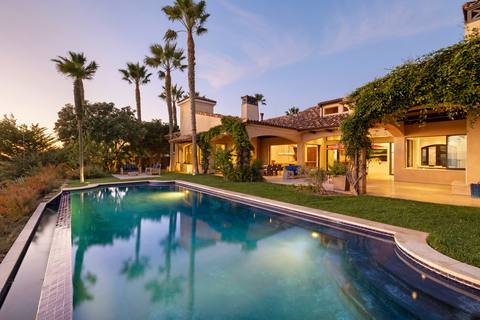 Pool and residence at twilight